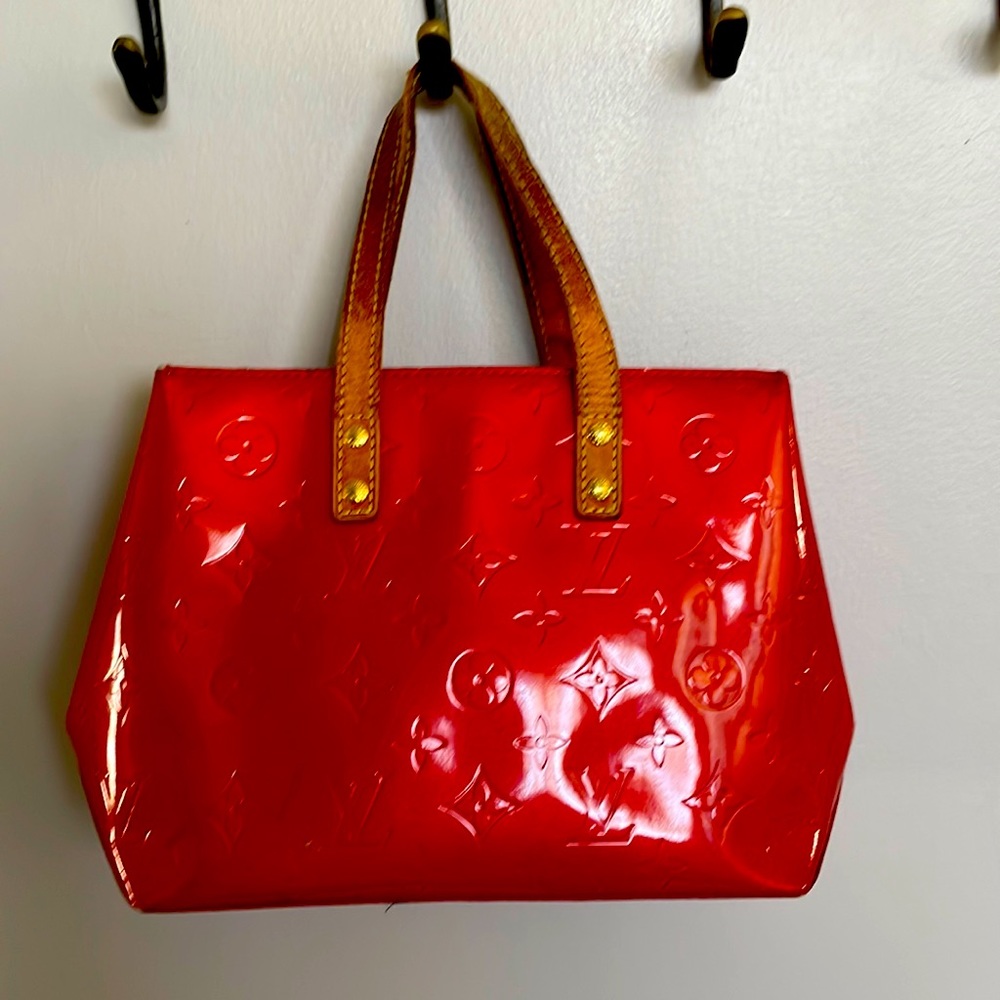 Red Louis Vuitton red vintage handbag. Great used condition.